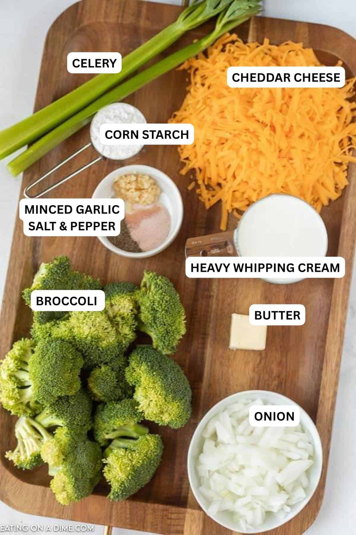 Ingredients for recipe - celery, cheddar cheese, corn starch, minced garlic, salt and pepper, heavy whipping cream, butter, onion, broccoli.