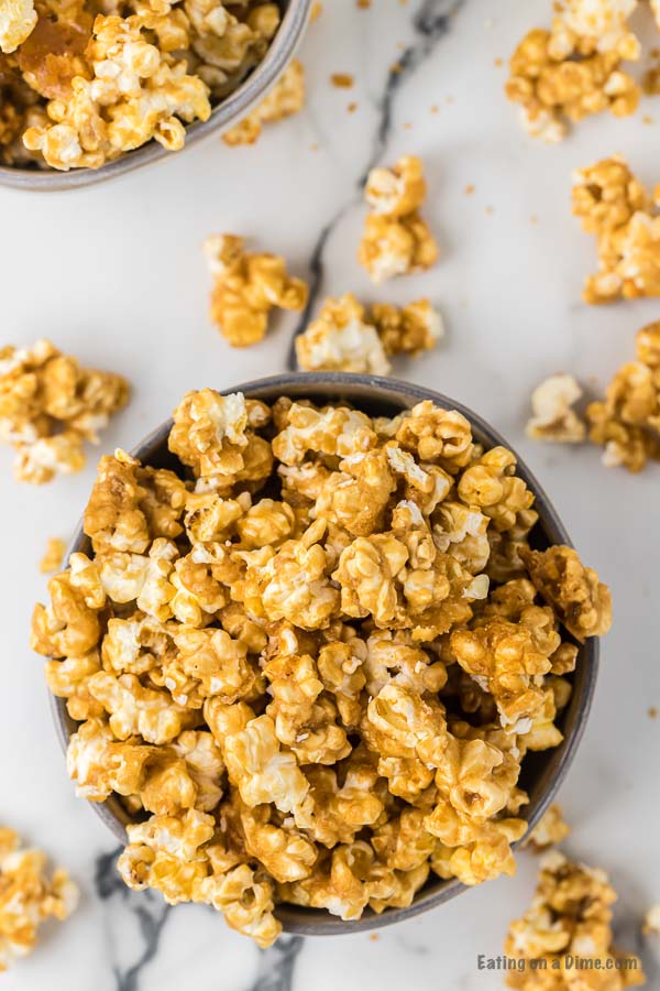 Close up image of caramel popcorn in a bowl. 