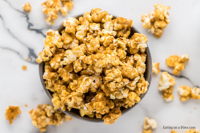 Close up image of caramel popcorn in a bowl. 