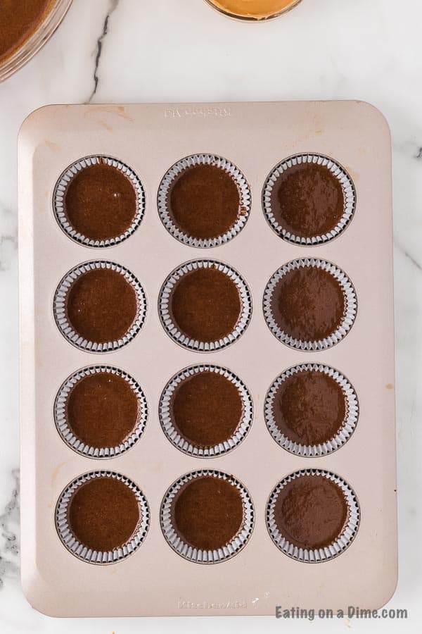 Dividing cupcake batter into the muffin tin