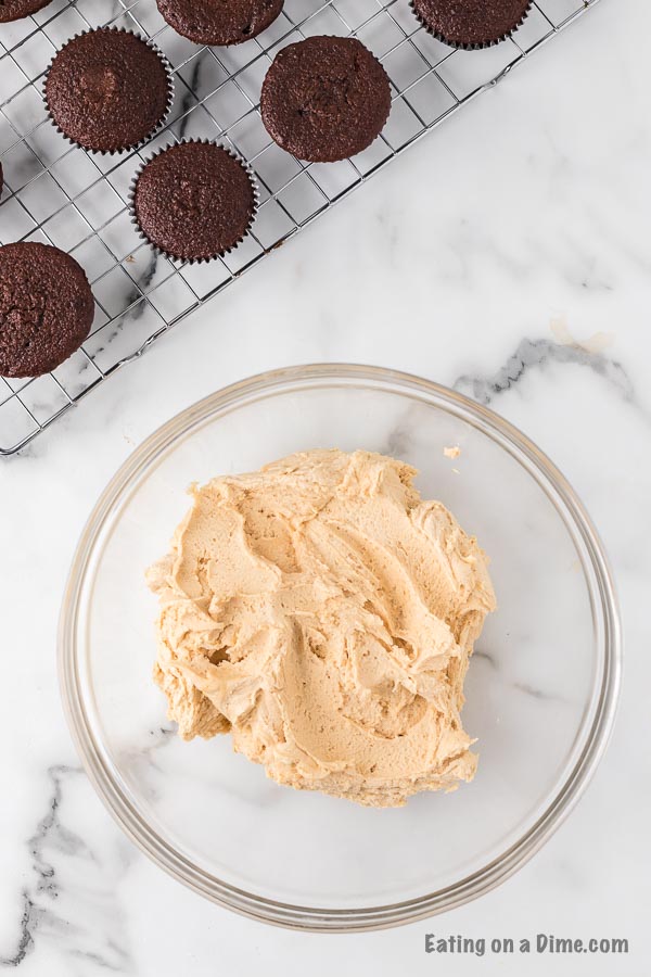 Combining the peanut butter frosting in a bowl
