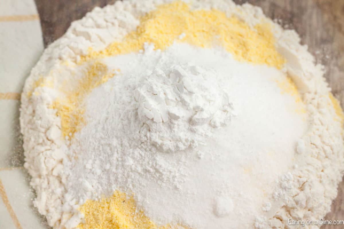 Cornbread Muffins are just so easy to make and much better than those store bought mixes. This cornbread muffin recipe is delicious and a family favorite. flour and cornmeal