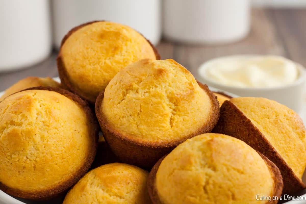 Cornbread Muffins are just so easy to make and much better than those store bought mixes. This cornbread muffin recipe is delicious and a family favorite. bowl of corn muffins