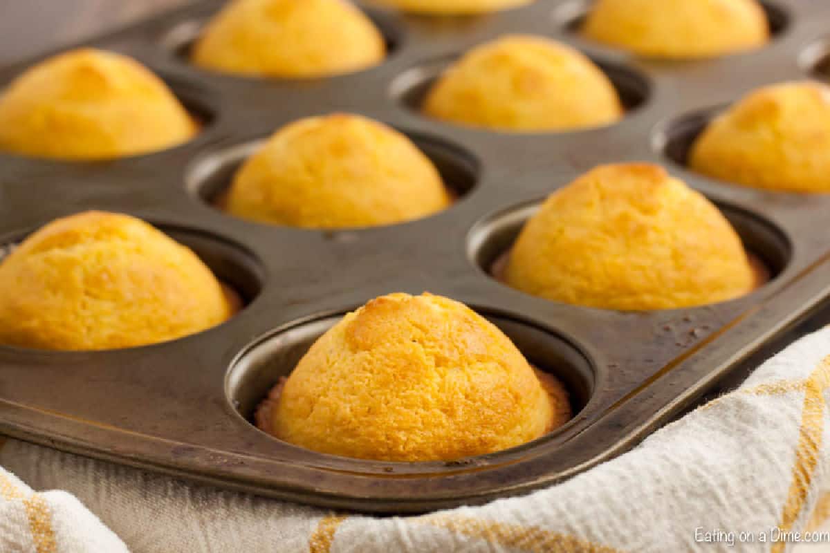 Cornbread Muffins are just so easy to make and much better than those store bought mixes. This cornbread muffin recipe is delicious and a family favorite. corn muffins in muffin pan