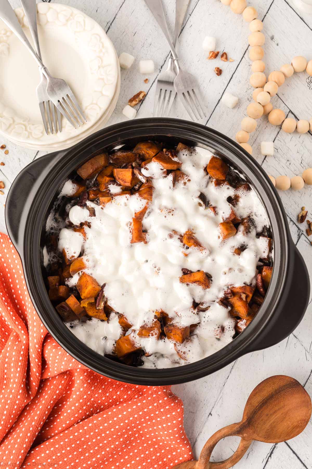 Sweet potato casserole in the slow cooker with melted marshmallows