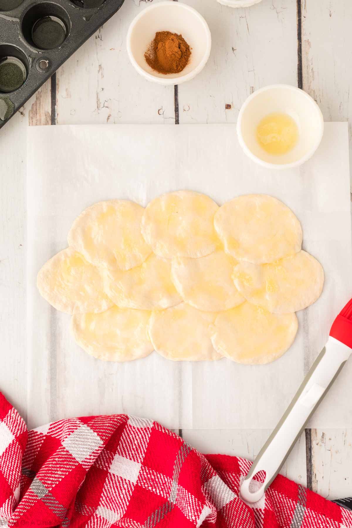 Adding butter on the biscuits