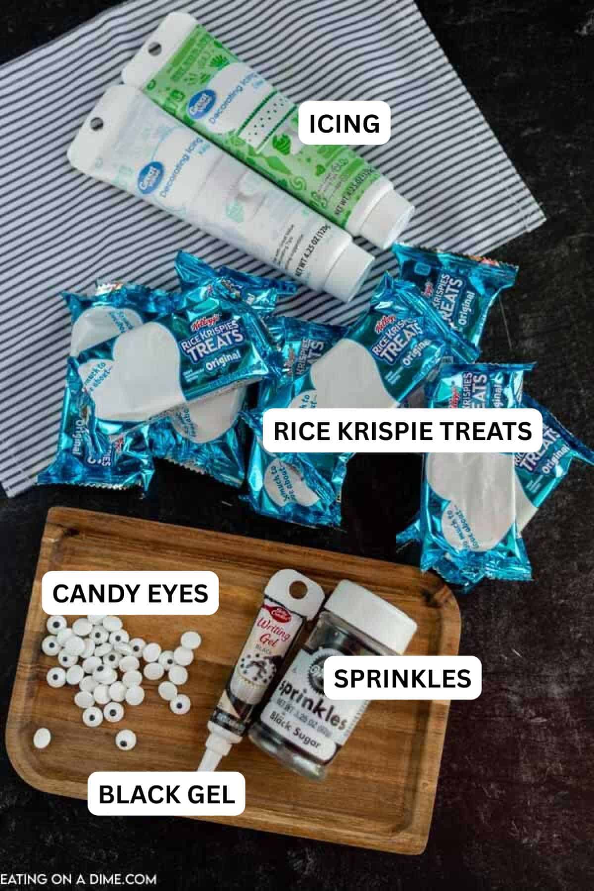 Ingredients for recipe: Rice Krispie Treats, candy eyes, decorating icing, black writing gel, black sugar sprinkles.