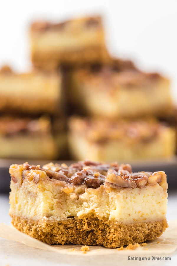 Pecan pie cheesecake bars combine all that you love about cheesecake and pecan pie. This is the perfect dessert and so easy to make. 