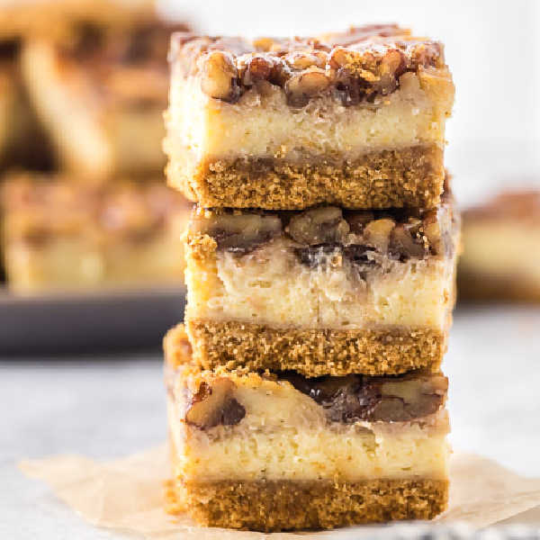 Pecan pie cheesecake bars combine all that you love about cheesecake and pecan pie. This is the perfect dessert and so easy to make. 