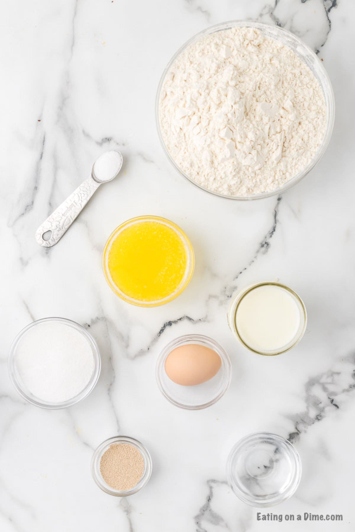 Ingredients for recipe: flour, yeast, salt, butter, eggs and milk. 