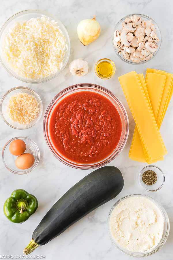 Ingredients for recipe: cheese, vegetables, sauce, seasoning. 