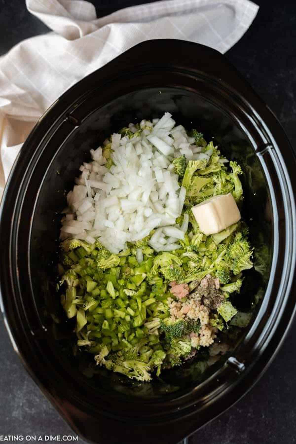 broccoli, onion, butter and seasoning in the crockpot