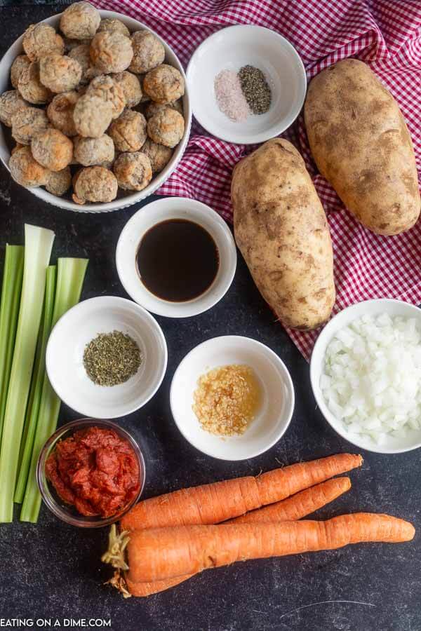 Ingredients for stew: meatballs, seasoning, potatoes, celery, carrots, onion, tomato paste.