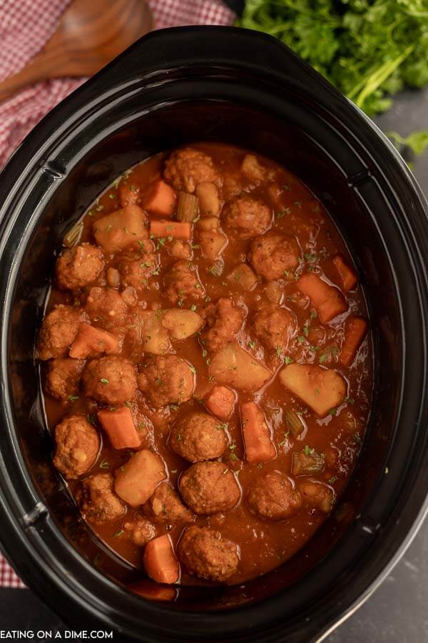 Crock pot of meatball stew. 