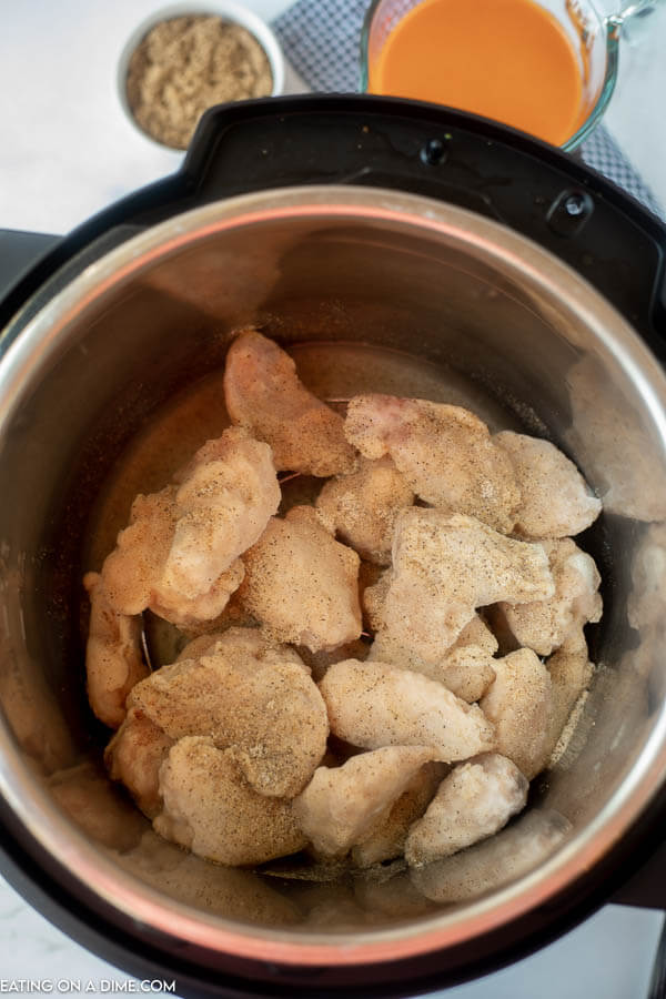 Close up image of chicken wings in the instant pot. 