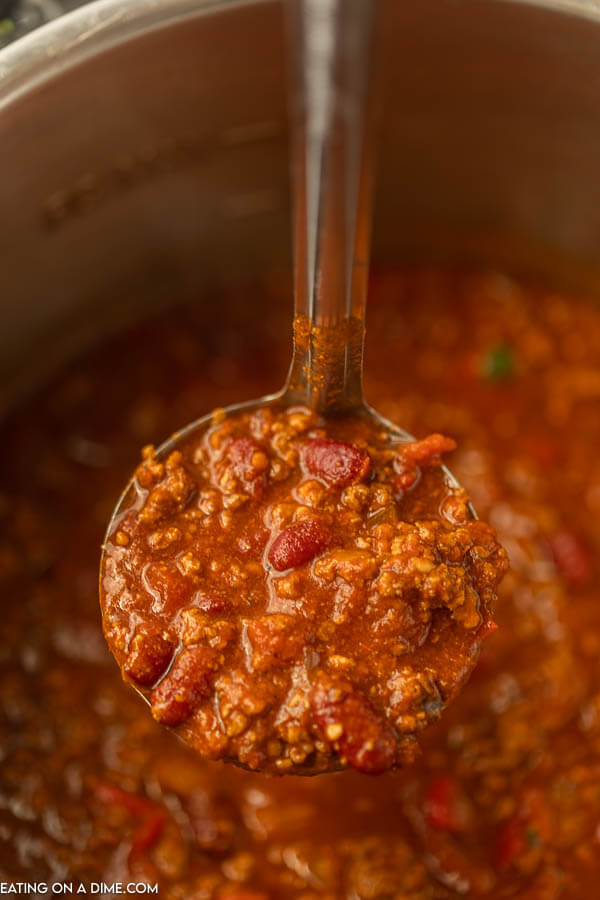 Close up image of a ladle of chili.  