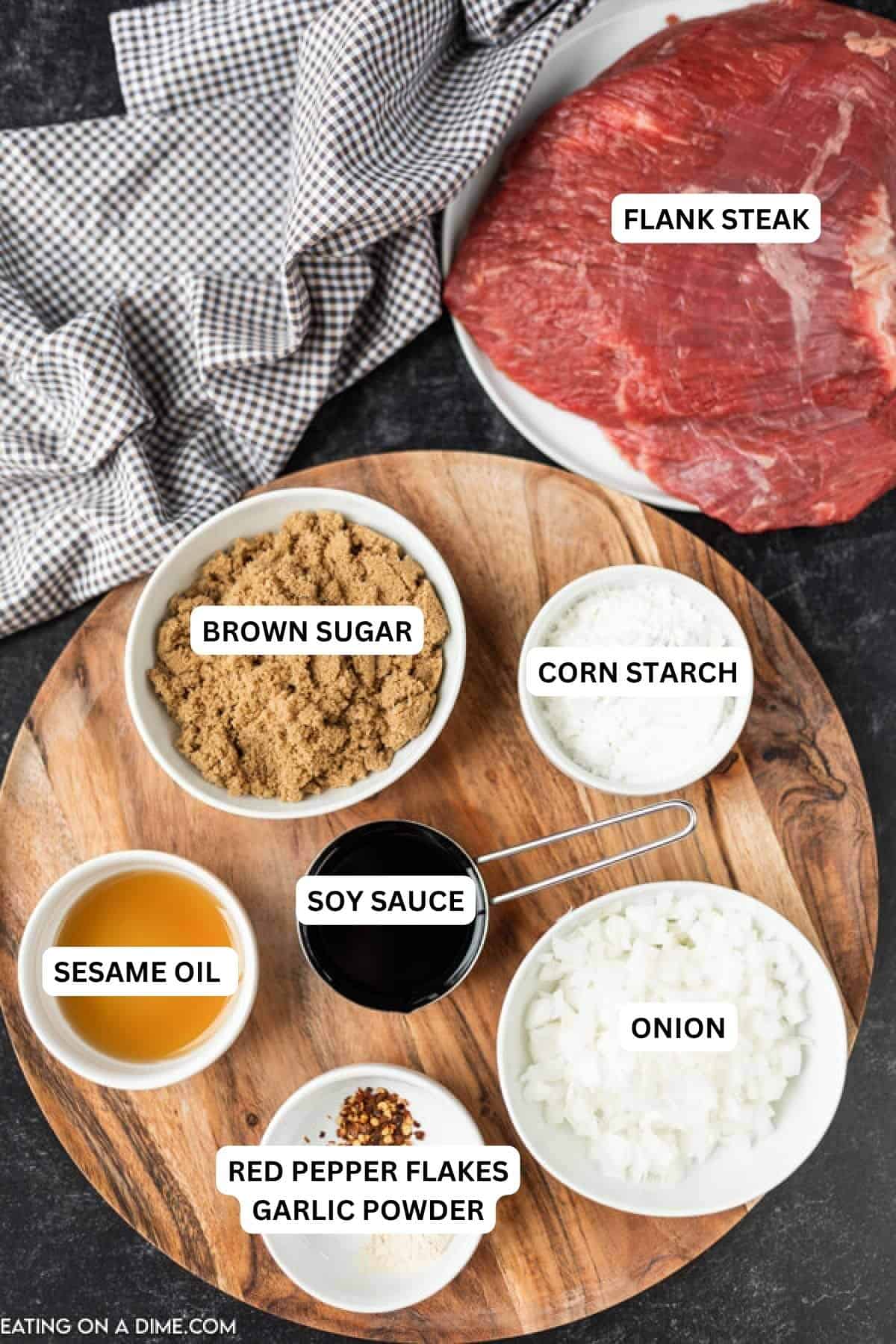 You are going to love this crock pot korean bbq recipe! Serve this slow cooker korean bbq over rice and a side of veggies for a simple meal! Ingredients for recipe: flank steak, brown sugar, corn starch, sesame oil, soy sauce, onion, red pepper flakes and garlic powder.