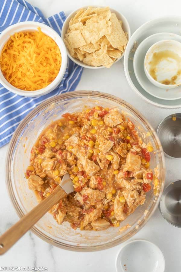 Mixing bowl with chicken and vegetable mixture.