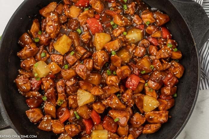 Skillet of pineapple chicken recipe.