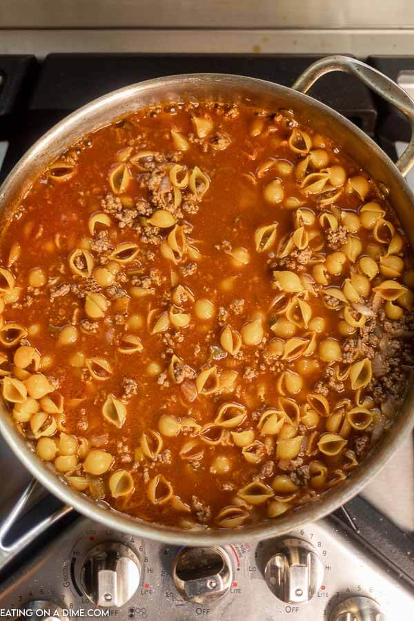 Close up image of taco pasta in a saucepan in process. 