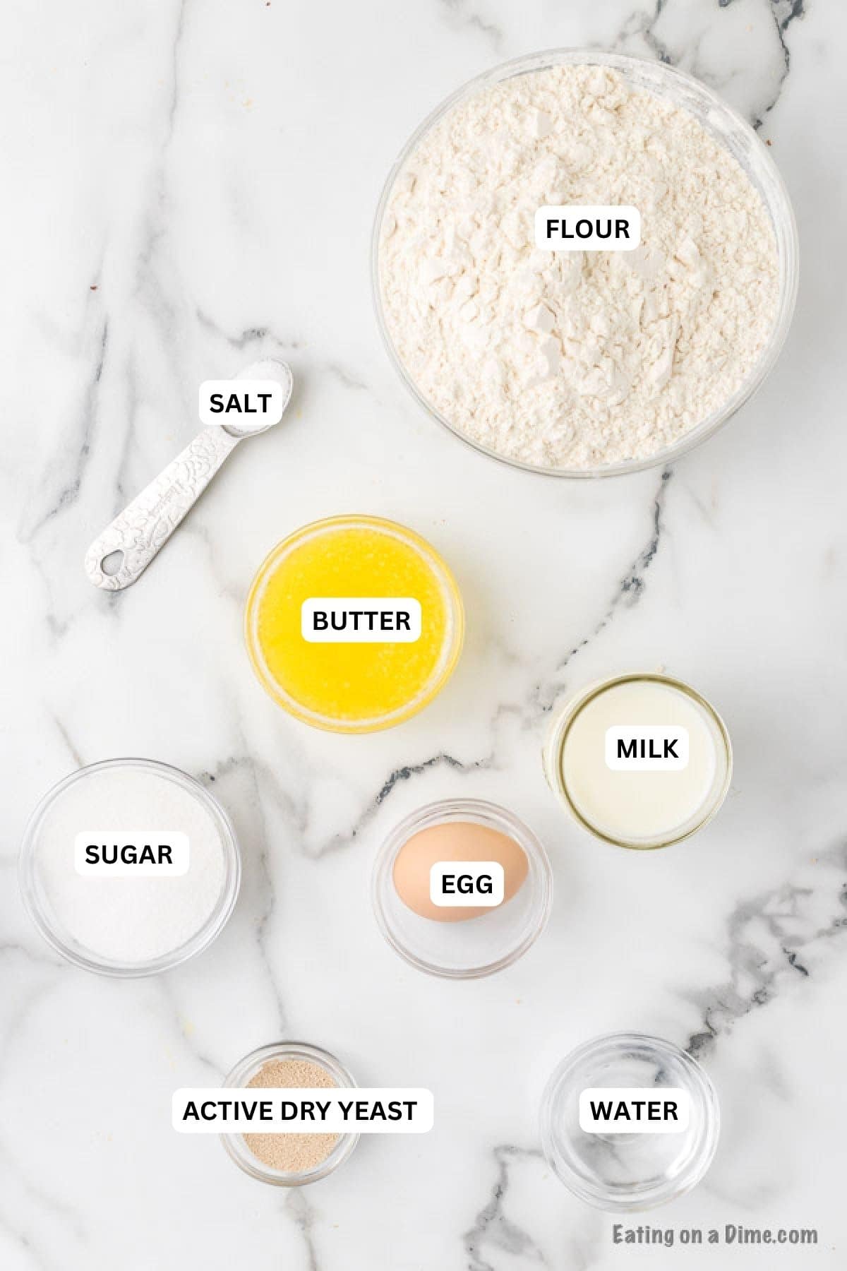 Ingredients for recipe: flour, salt, butter, milk, sugar, egg, yeast and water.