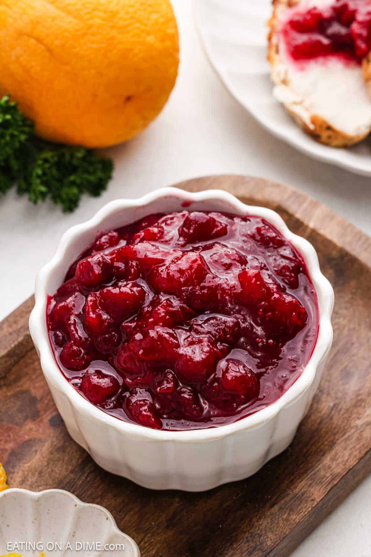 Red sauce in a white bowl.