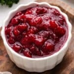 Cranberry sauce in a white bowl.