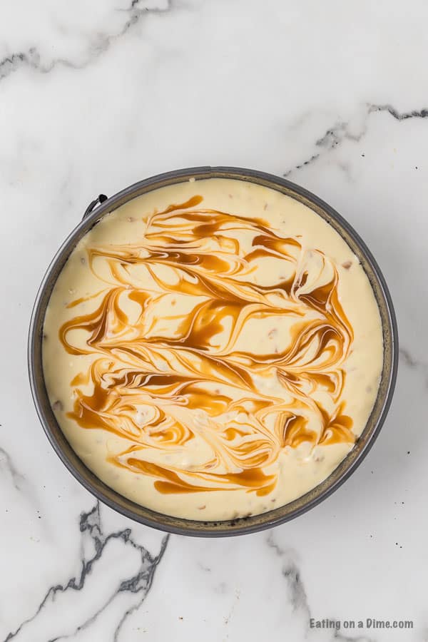 Swirling in the caramel sauce into the cheesecake batter