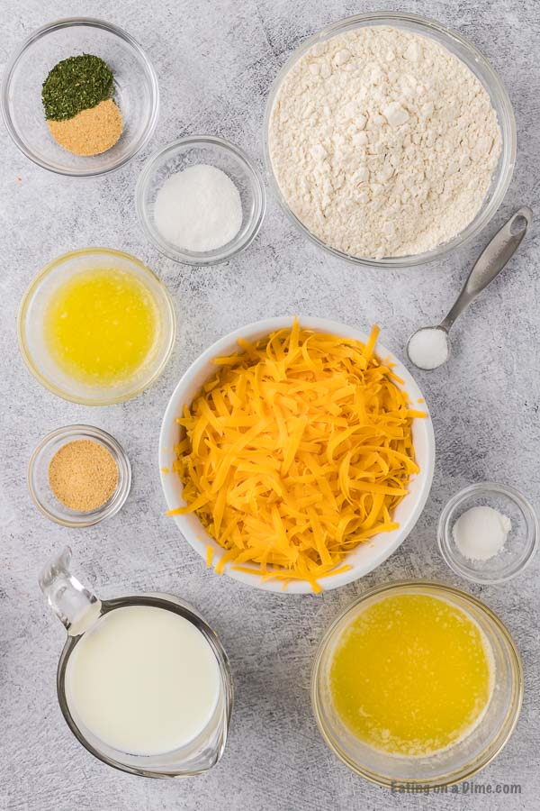 Ingredients needed - flour, baking powder, sugar, garlic powder, salt, butter, milk, cheese, garlic powder, parlsey