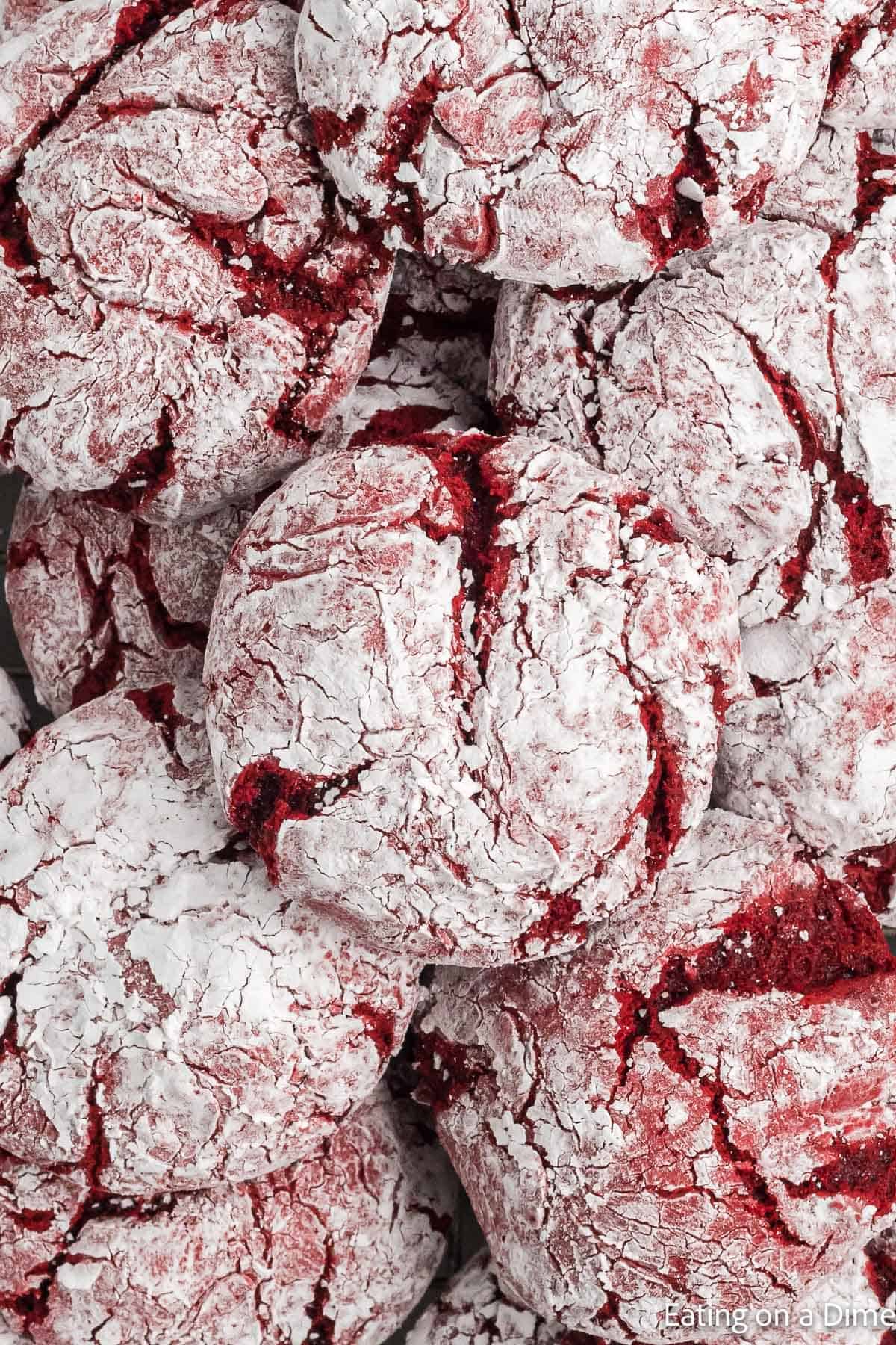 This Red Velvet Cookies Recipe is easy to make because you only need 4 ingredients. Easy Red velvet crinkle cookies are the best cake mix cookies! Close up Red Velvet Cookies