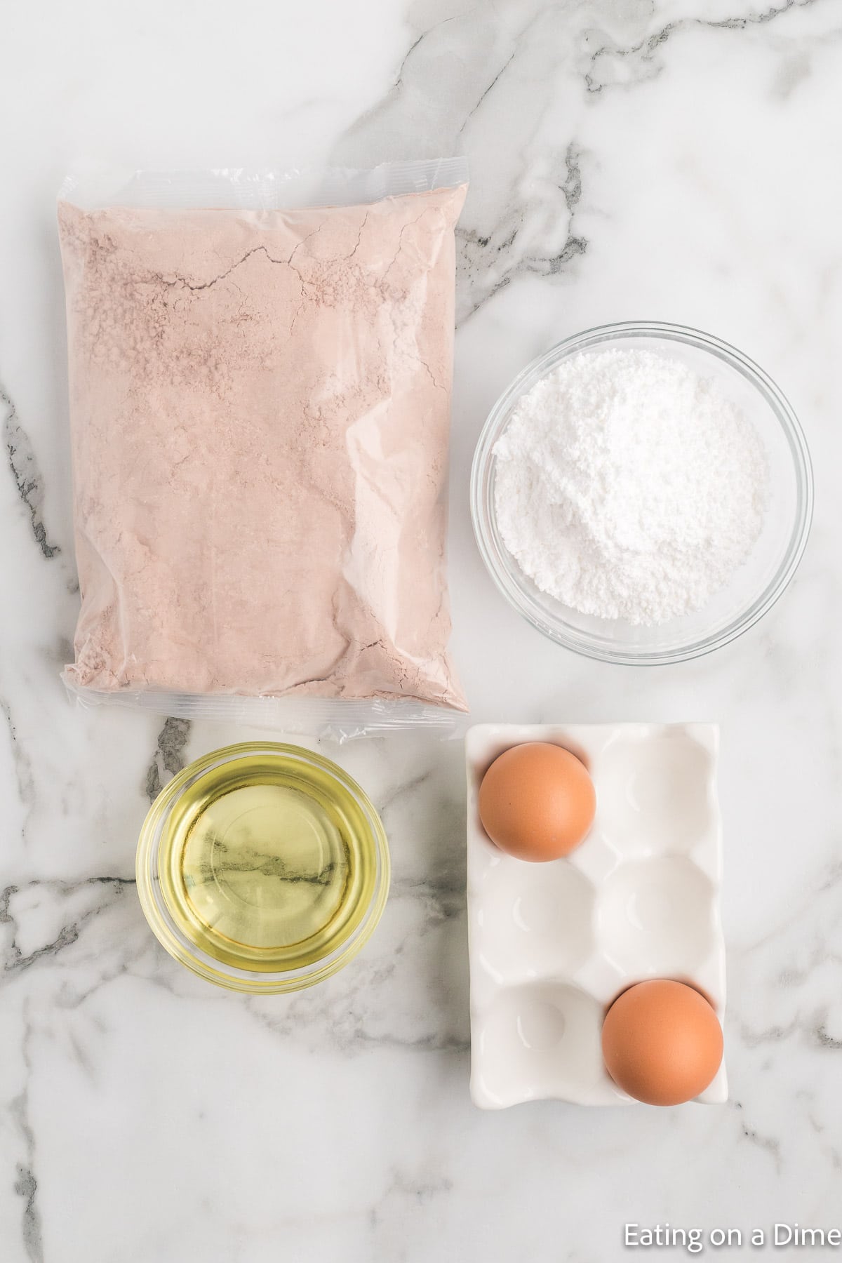 Red velvet cookies ingredients - red velvet cake mix, eggs, oil, powdered sugar