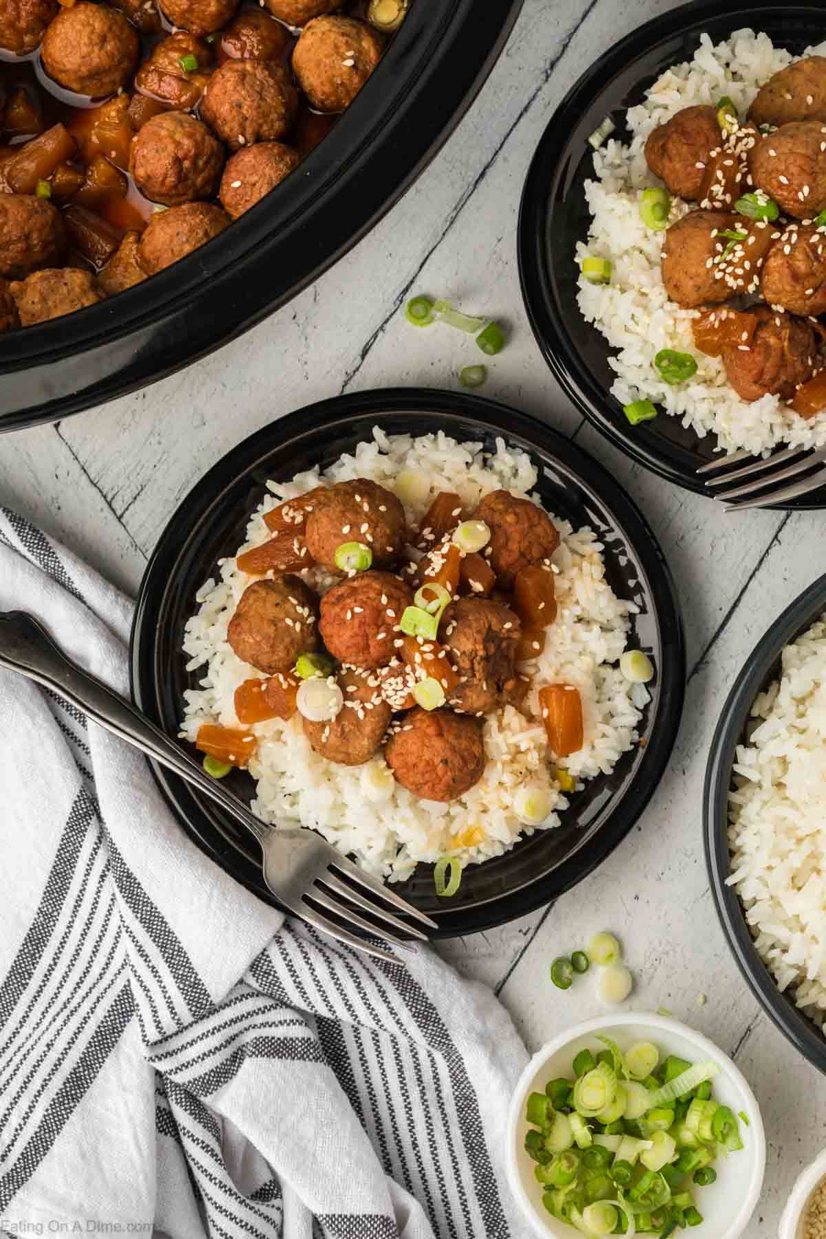 Teriyaki Meatballs on rice on a plate