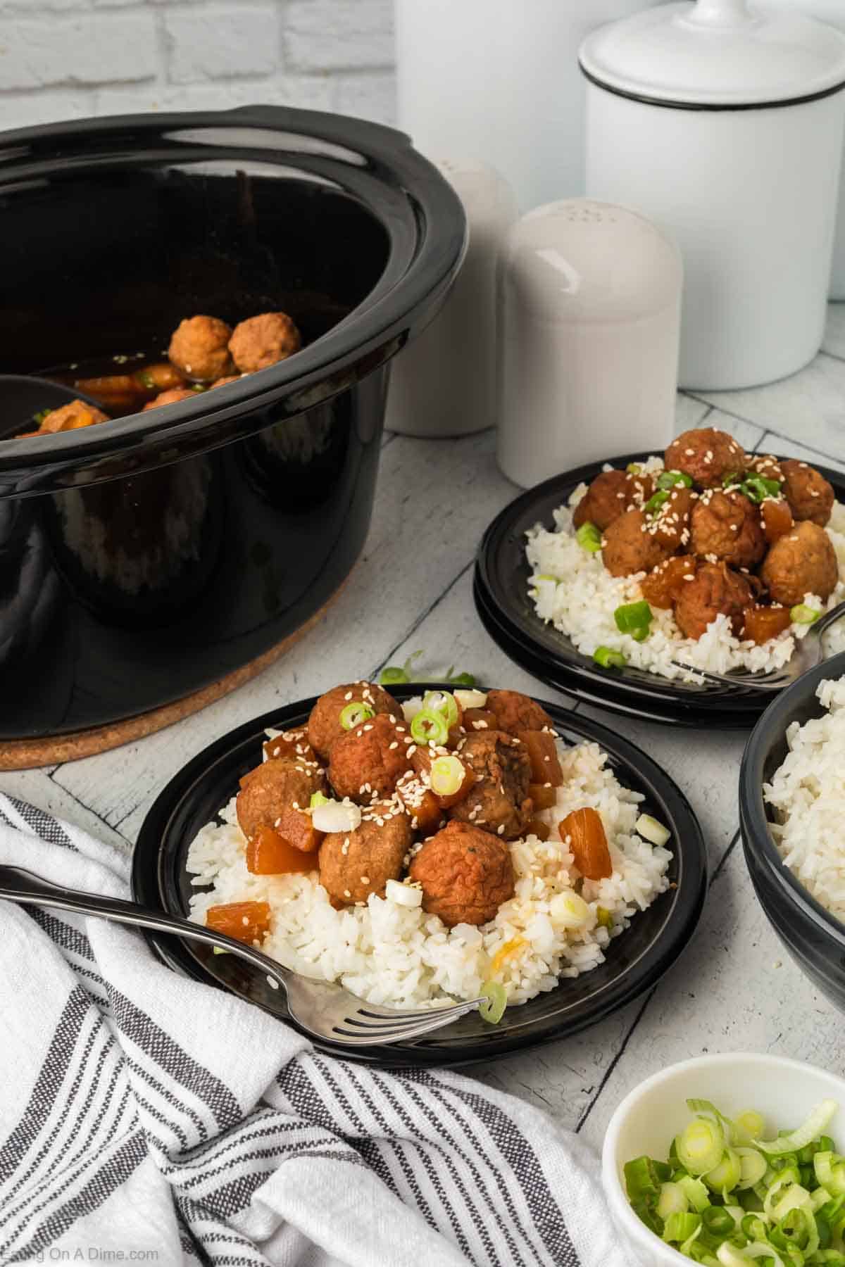 Teriyaki Meatballs on rice on a plate