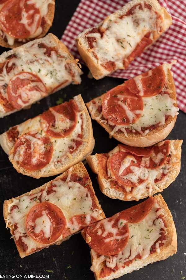Close up image of french bread pizza sliced. 