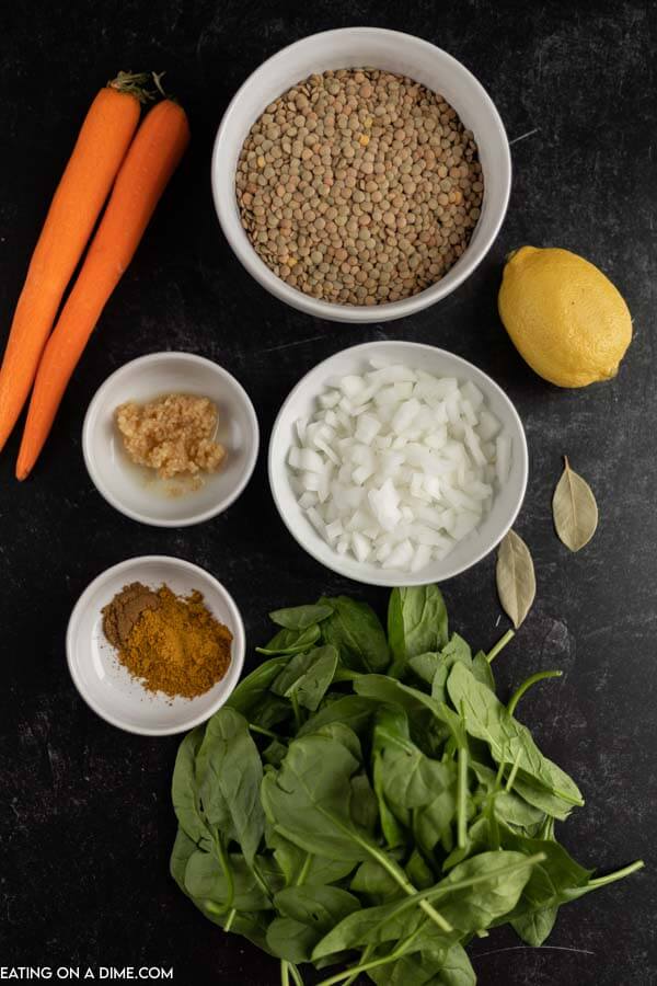 Ingredients for recipe: lentils, lemon, onion, seasoning, carrots, spinach. 