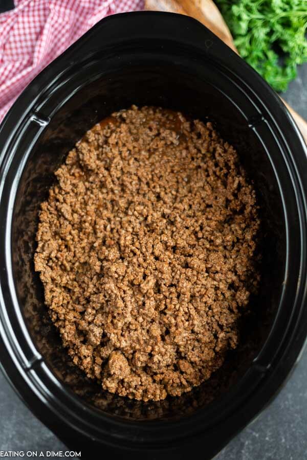 close up image of taco meat in the crockpot