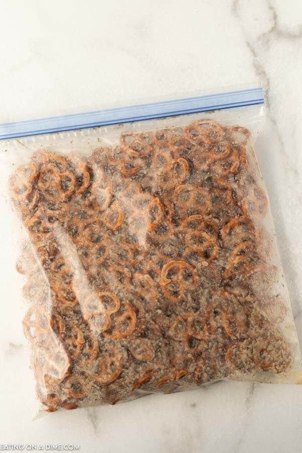 The large bag seals and shaken to coat the pretzels with the oil and seasonings 