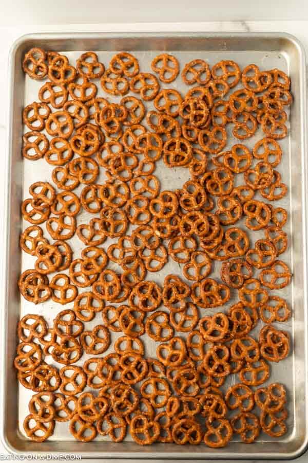 The pretzels on a baking sheet cooling after they have been baked 