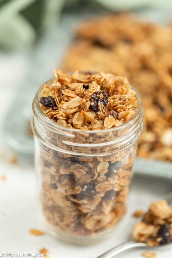 Close up image of granola in a mason jar. 