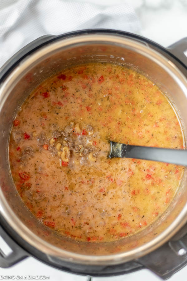 Ingredients in pressure cooker ready to cook. 