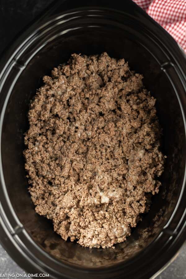 Close up image of ground beef in the crock pot. 