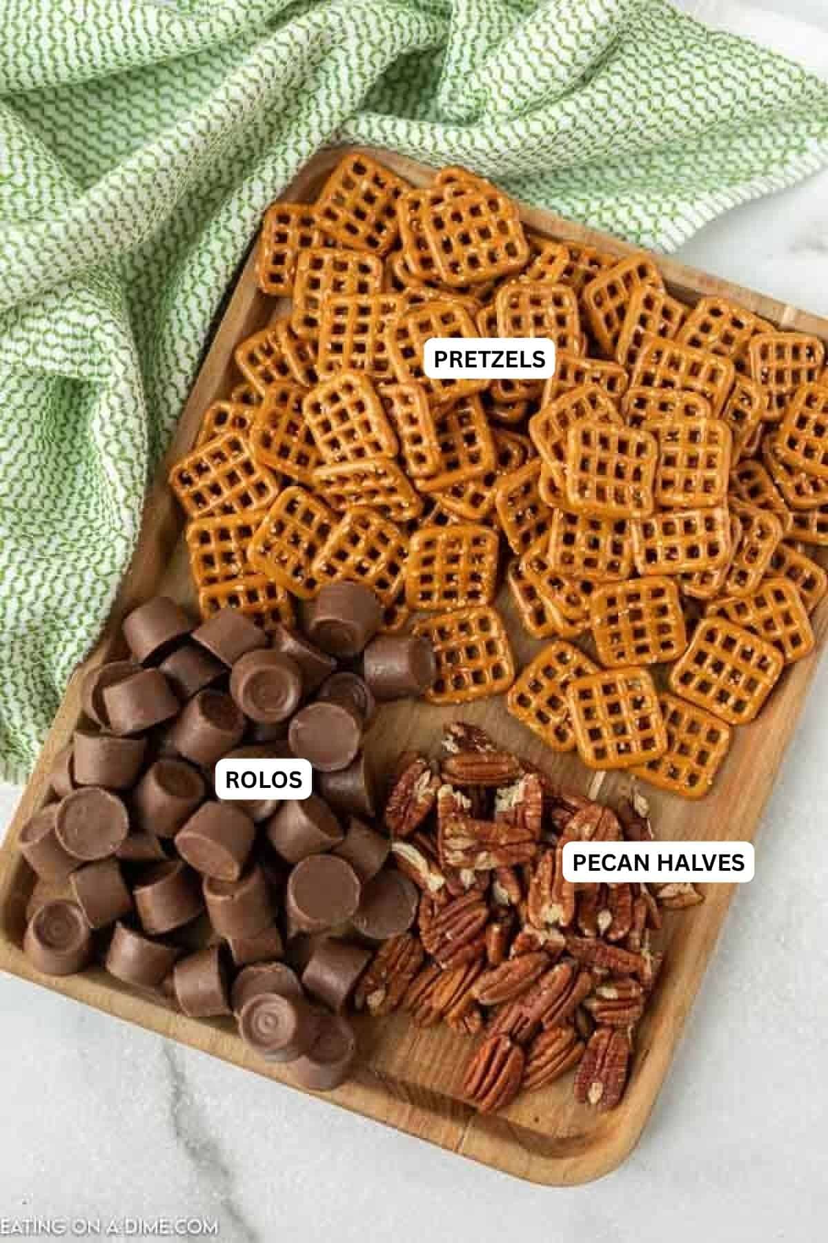 Ingredients for recipe: pecan halves, rolos and pretzels.