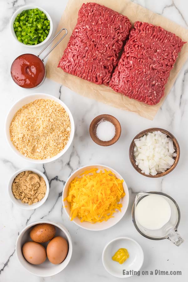 Ingredients needed for meatloaf - ground beef, onion, green bell pepper, ritz crackers, cheddar cheese, milk, salt and pepper, ketchup brown sugar, mustard. 
