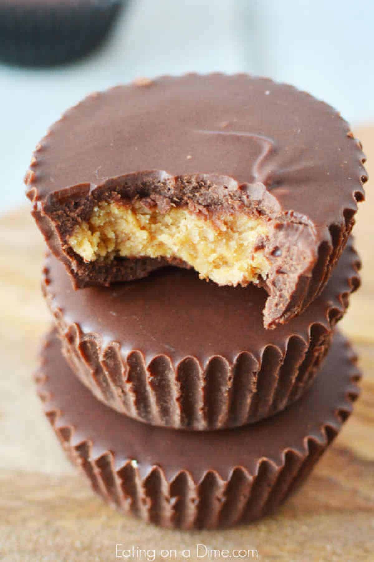 Everyone will love this Chocolate Peanut Butter Cups Recipe. Peanut butter and chocolate fans will go crazy over Easy Chocolate peanut butter cups. Yummy! Chocolate Peanut Butter Cups stacked together.