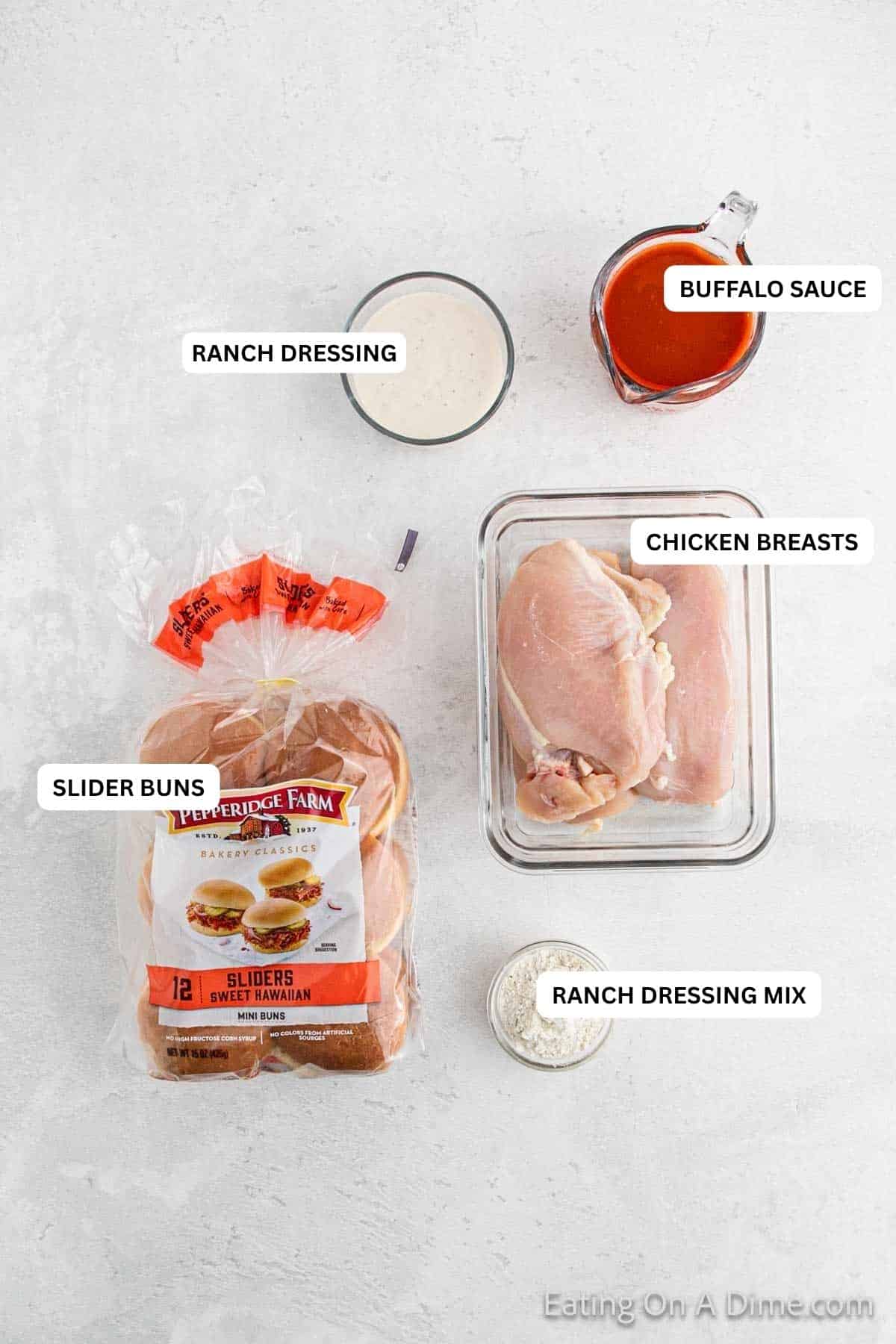 Ingredients for recipe: ranch, slider buns, chicken breasts and buffalo sauce.