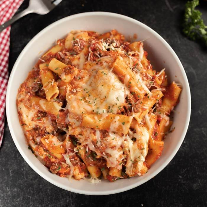 Bowl of slow cooker baked ziti. 