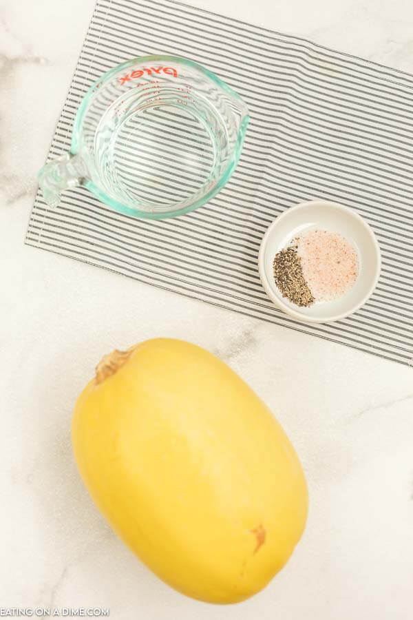 Ingredients needed for Instant Pot Spaghetti Squash - Squash, salt and pepper and water. 