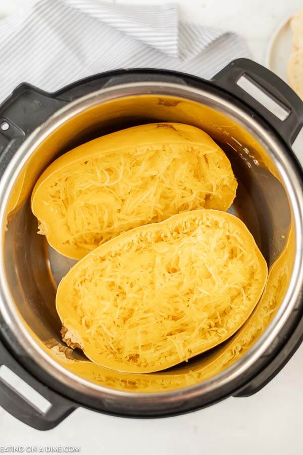 Close up image of cooked spaghetti squash in the instant pot. 