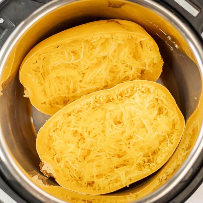 Close up image of cooked spaghetti squash in the instant pot. 