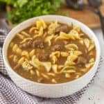 Steak soup in a bowl.